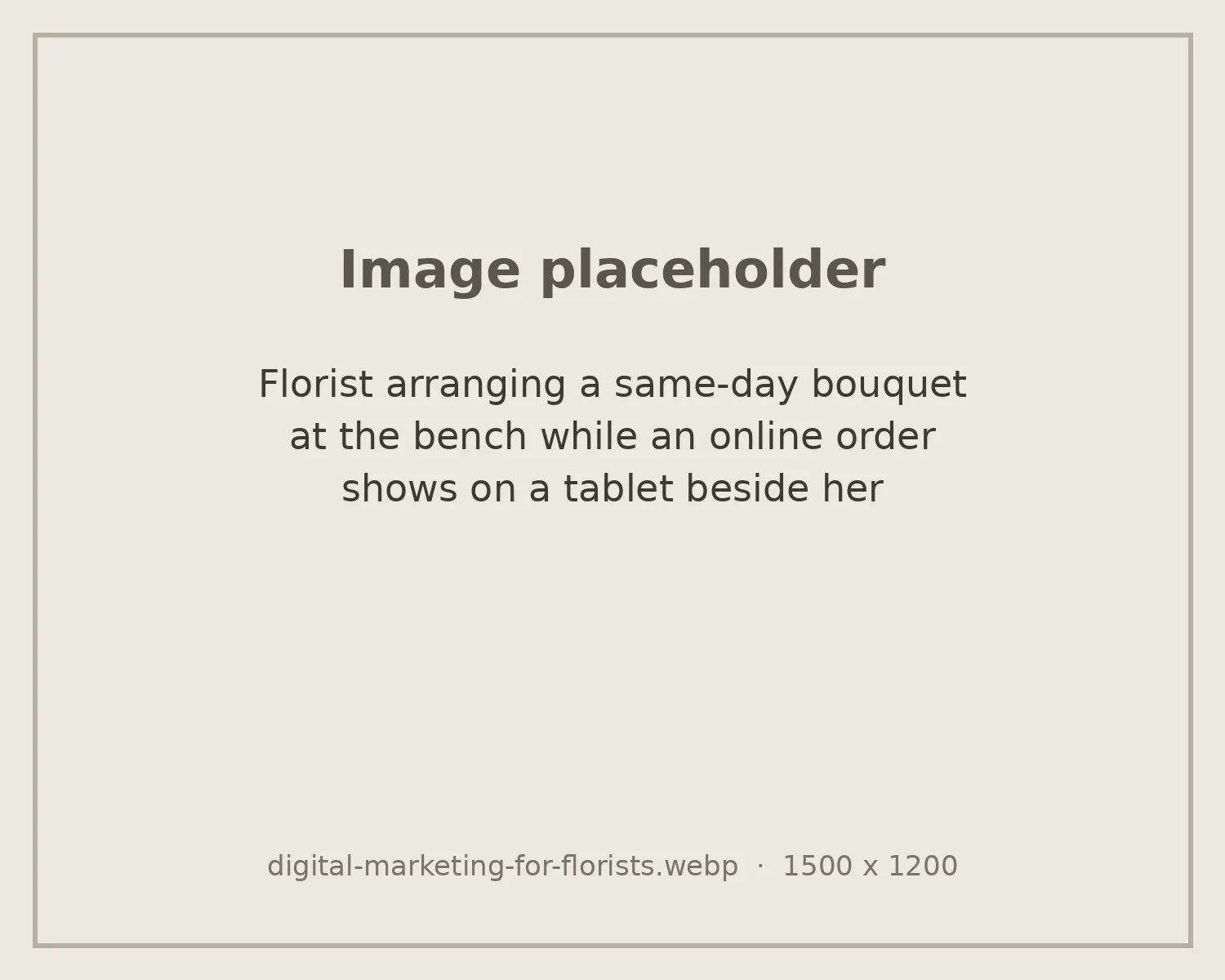 Florist arranging a same-day bouquet at the bench while an online order shows on a tablet beside her
